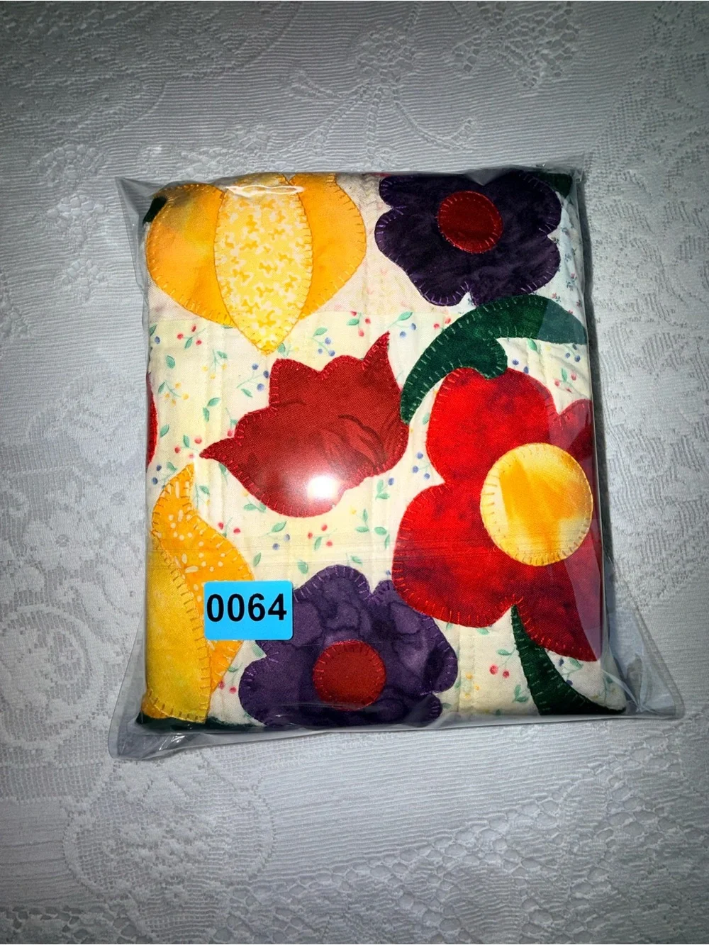 Handmade Floral Appliqué Wall Quilt in Red, Yellow, Purple, and Green
